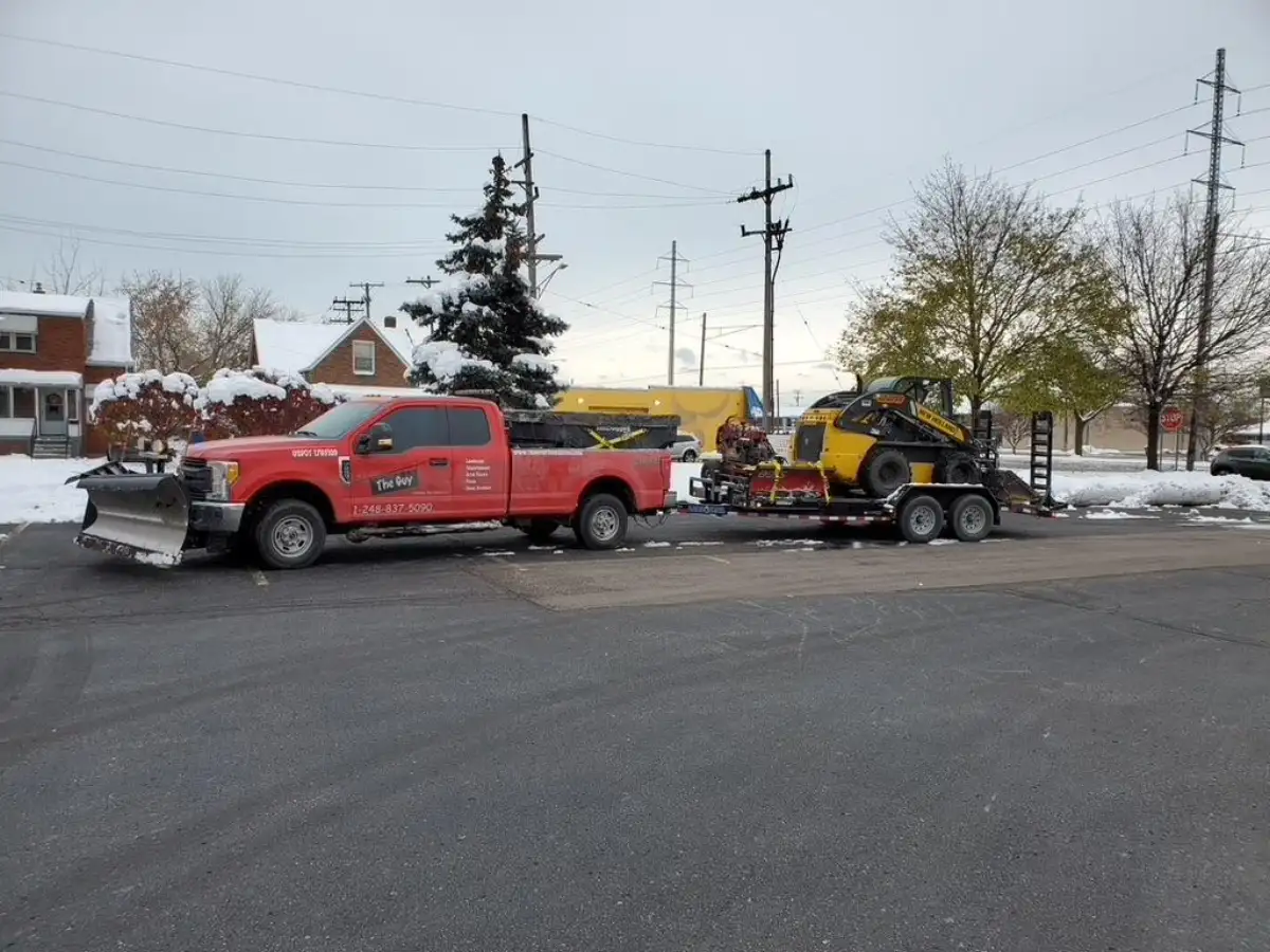Crew clearing snow from commercial sidewalks and walkways