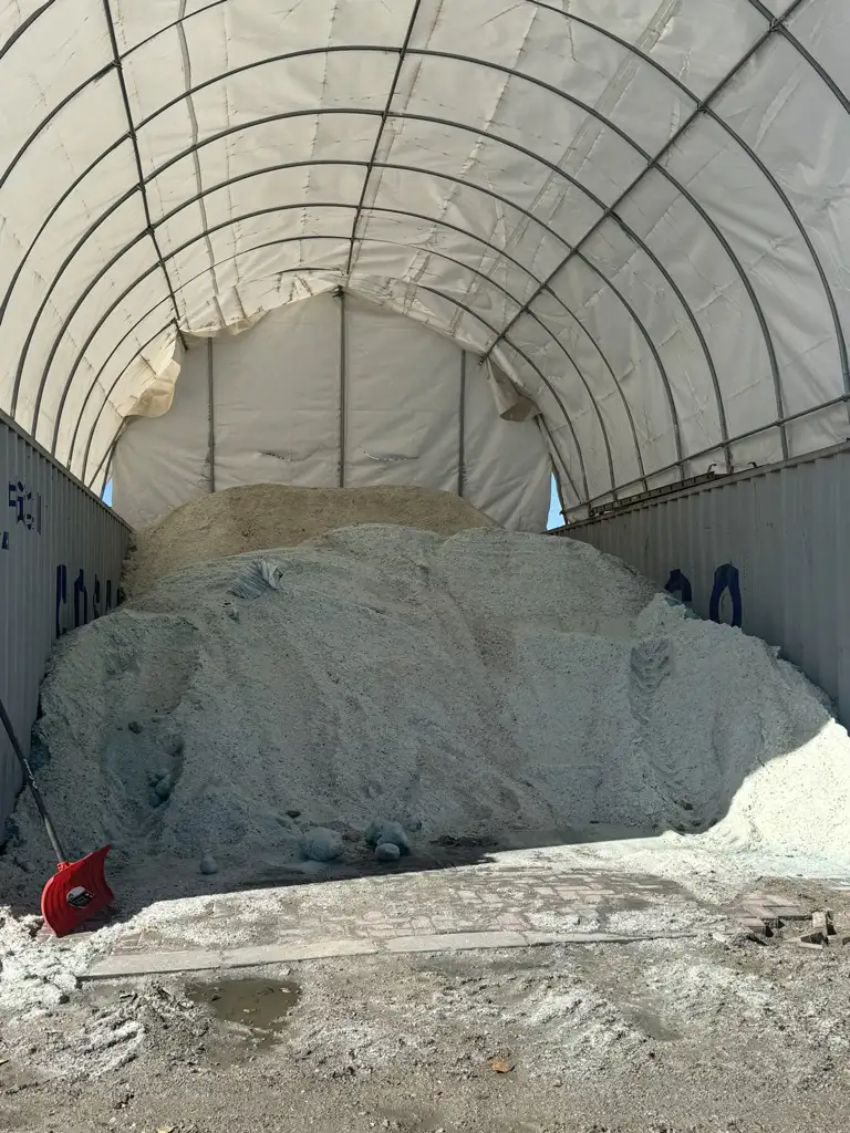Cleared commercial area with managed snow banks after a storm