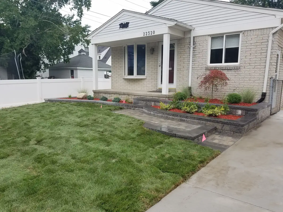Fresh residential landscaping and planting beds for a Warren, Michigan property