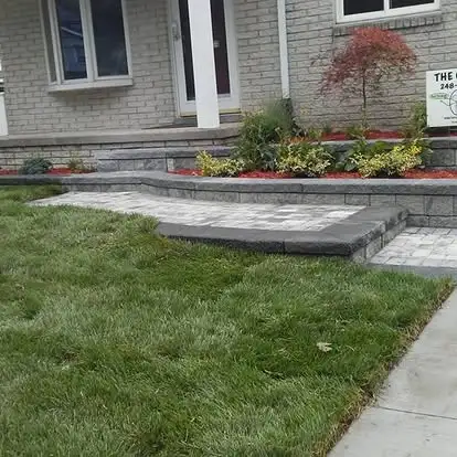 Mulched landscape bed with low-maintenance planting