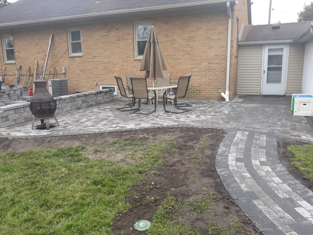 Brick paver patio installation by The Guy Outdoor Services in Metro Detroit
