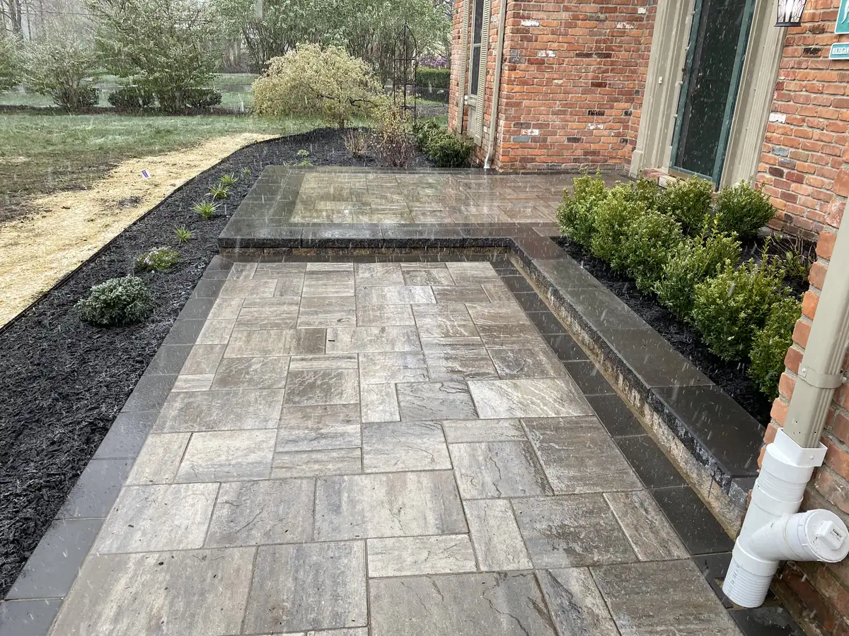 Outdoor kitchen built on a brick paver patio