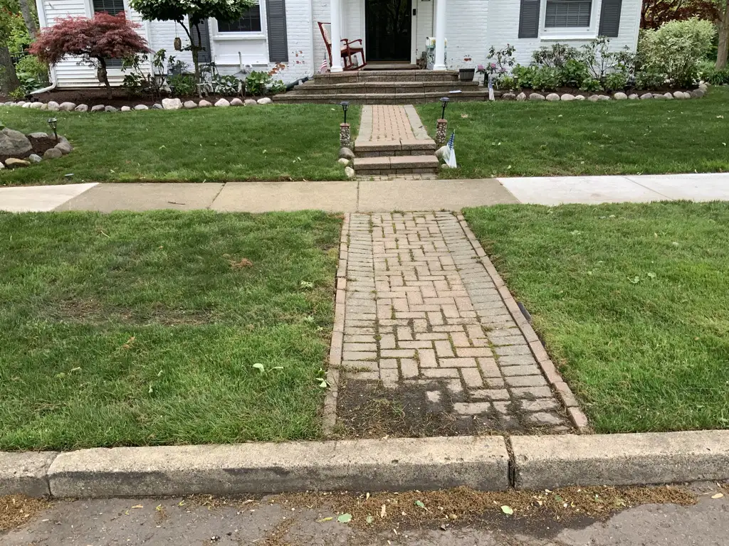 Custom paver steps and landing at a home entrance