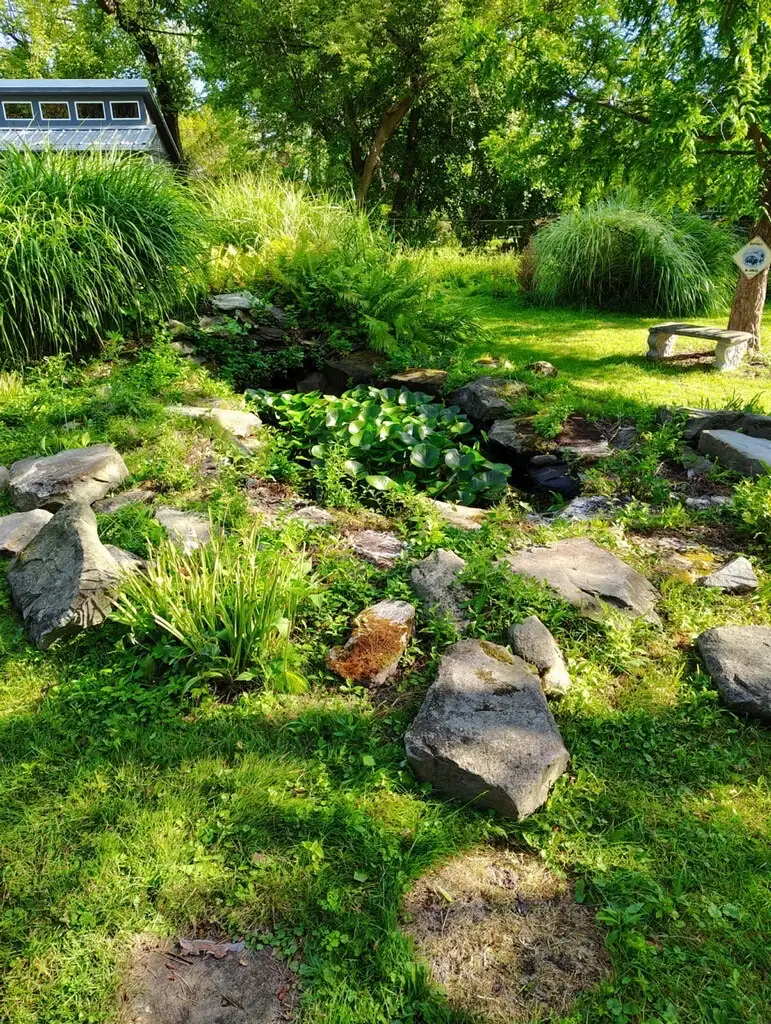 Custom water feature with natural stone construction